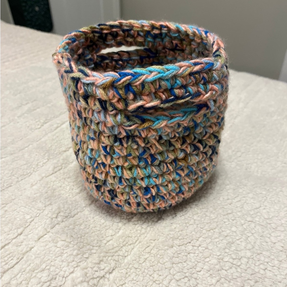 Small handmade crochet basket with handles